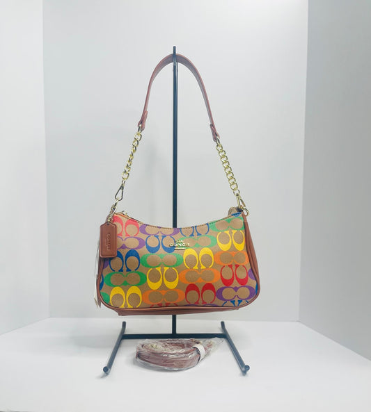 Coach mediana con crossbody